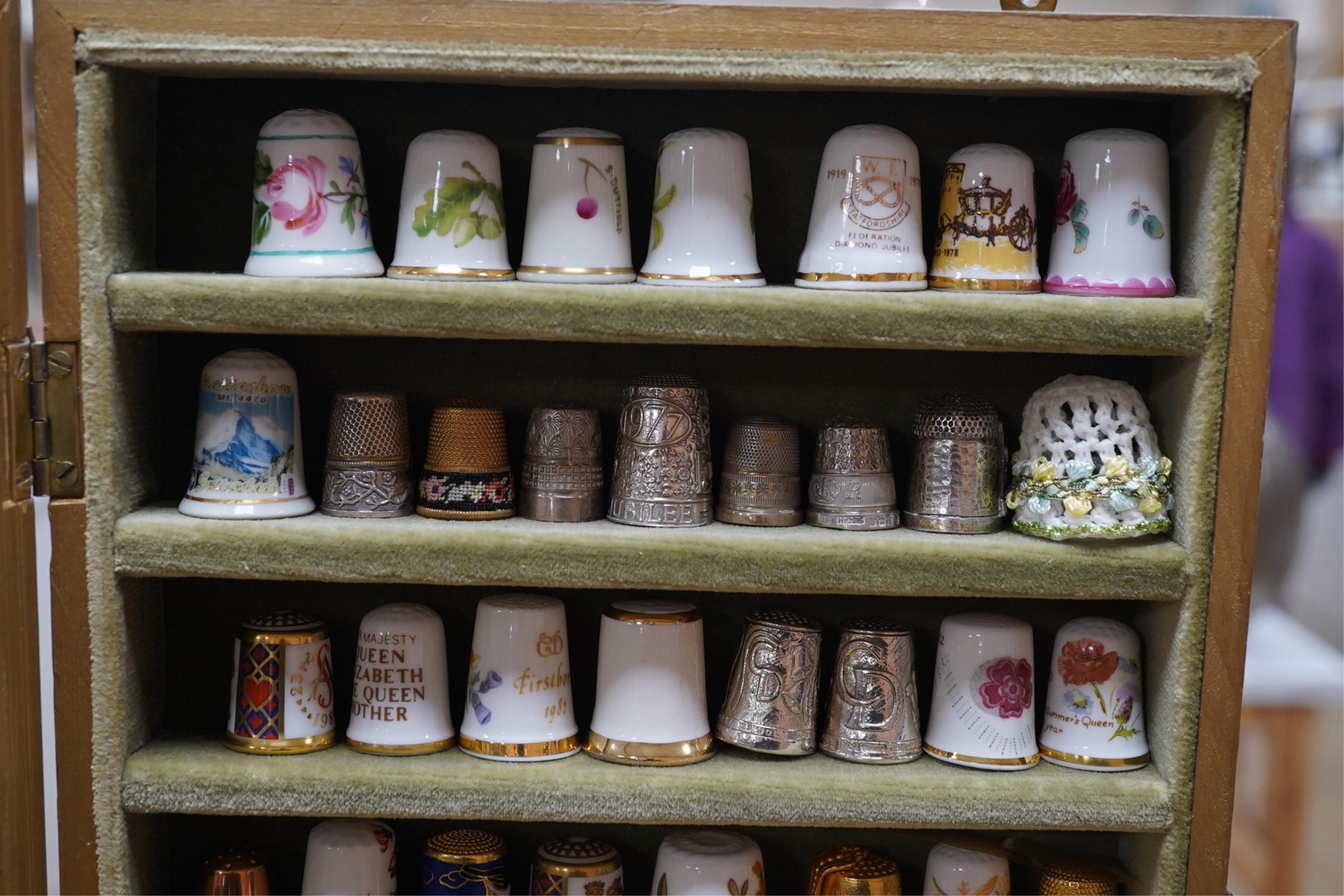 A collection of decorative thimbles, some silver. Condition - good